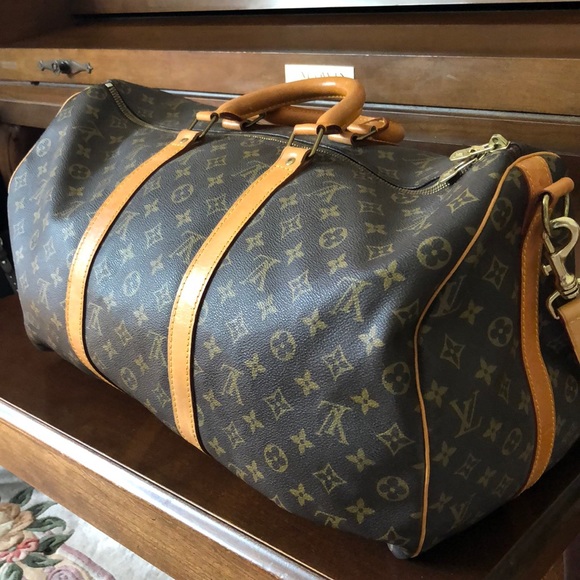 louis vuitton duffle bag used